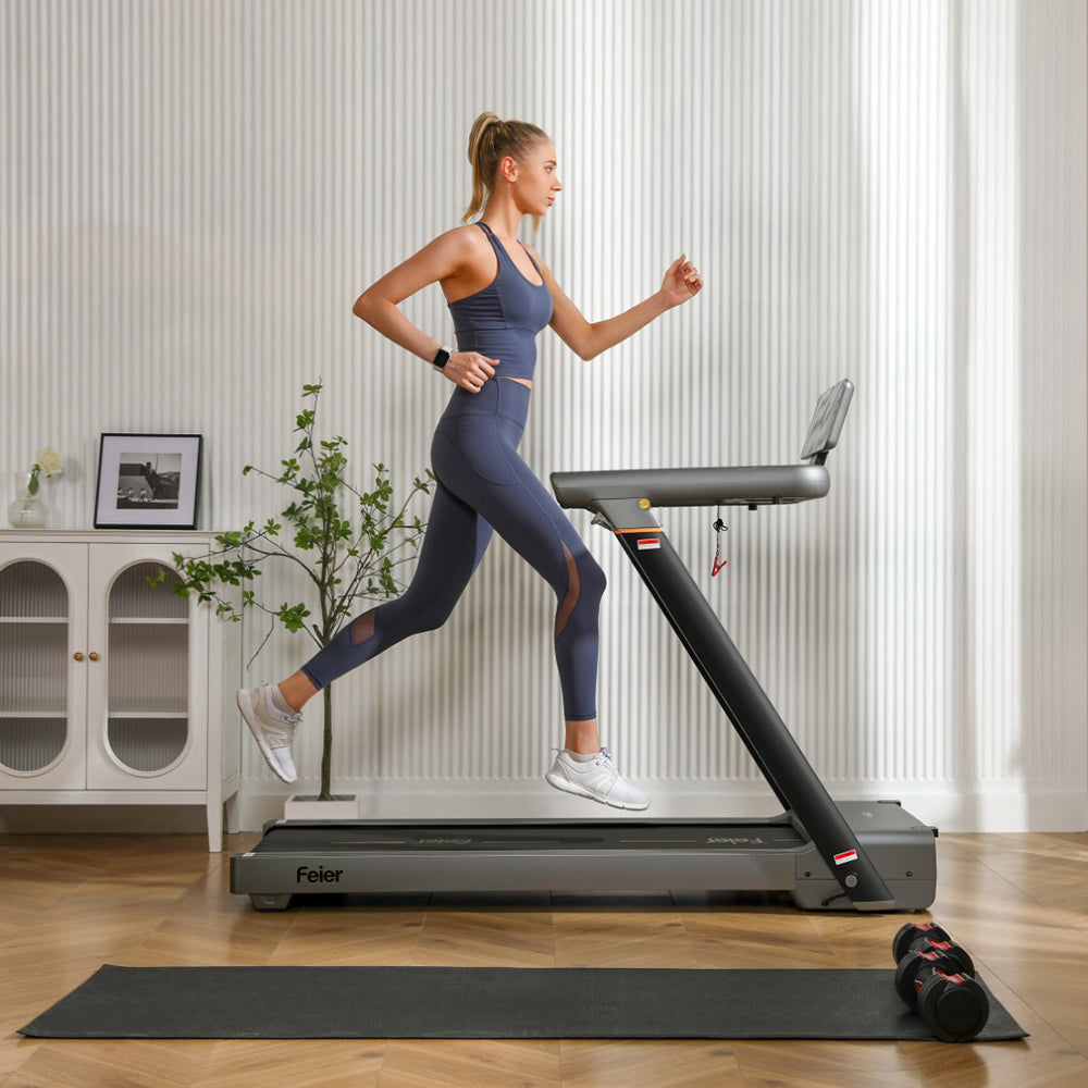 A woman running on a treadmill